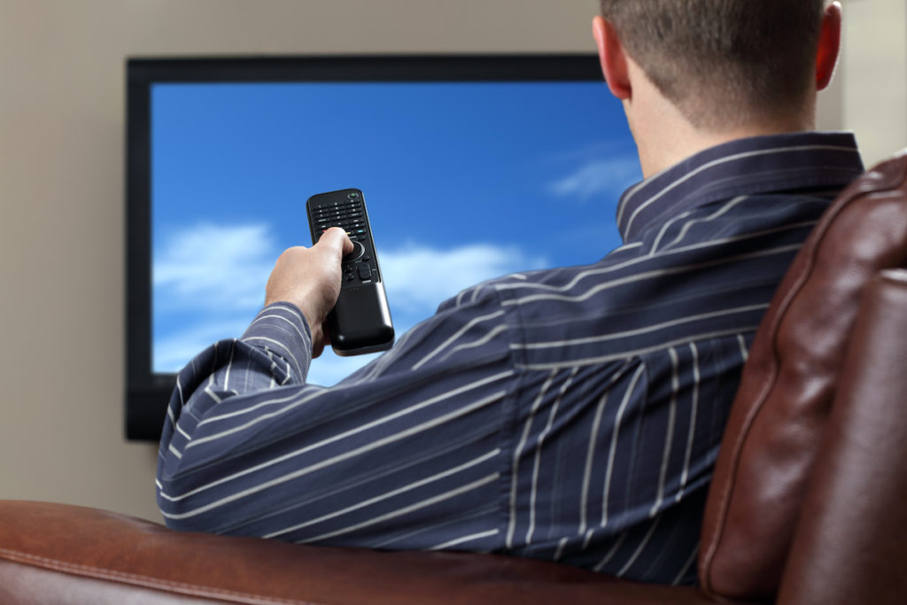 man watching tv