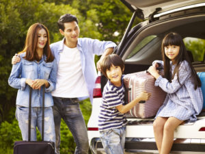 family unloading luggages