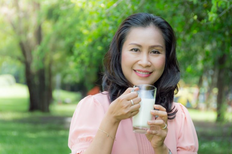 middle aged women drinking milk