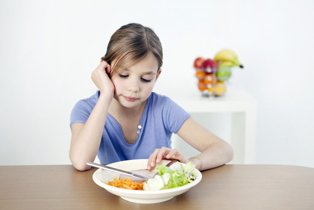 Child that doesn't want to eat the food on their plate