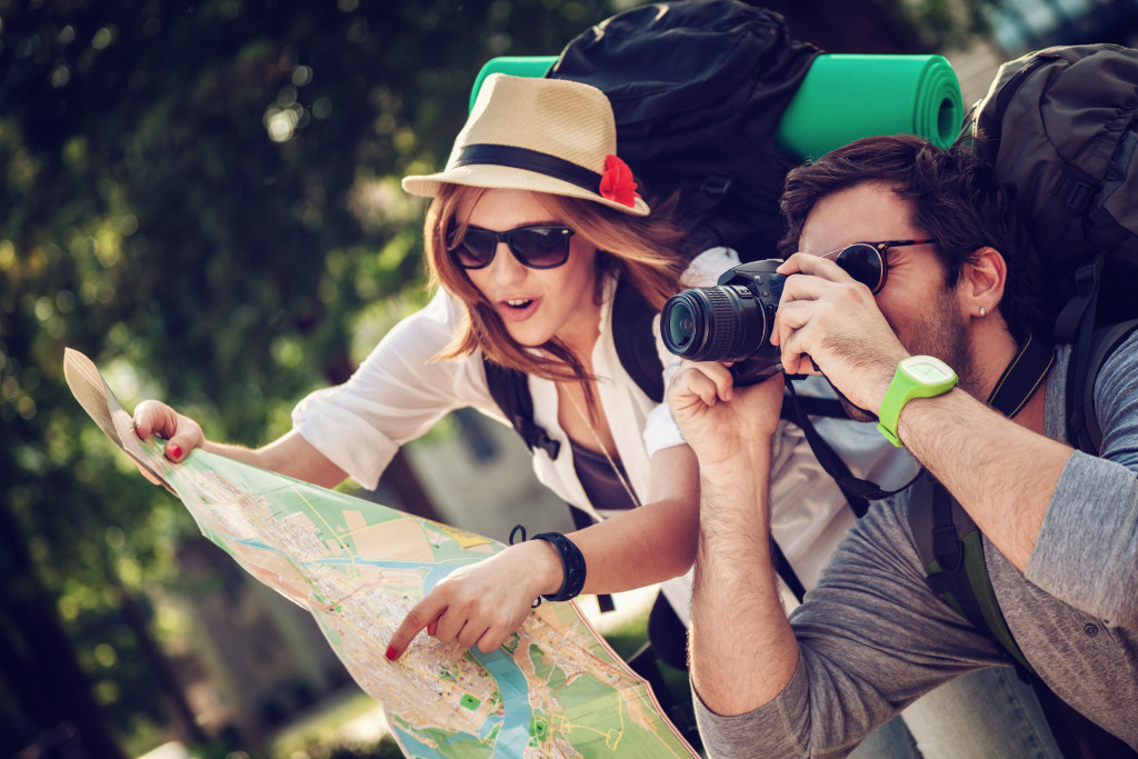 travelers taking pictures of the surrounding