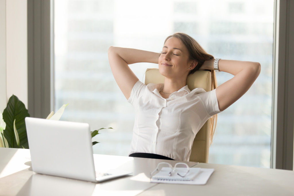 woman meditating in the office