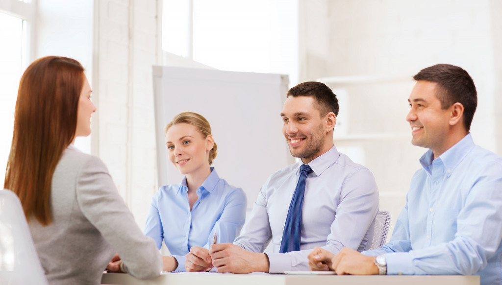 An applicant in front of the hiring board